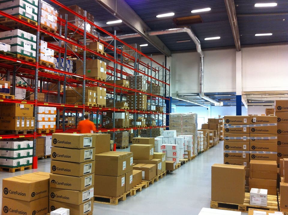 Aisle of a logistics warehouse with shelving