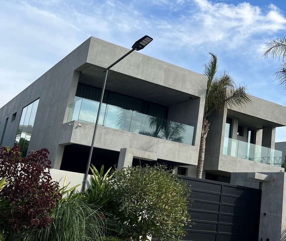 Modern villa with grey concrete-effect facade